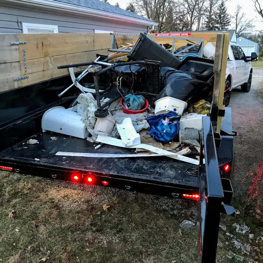Roll-off dumpster delivered to a residential driveway in Conewango